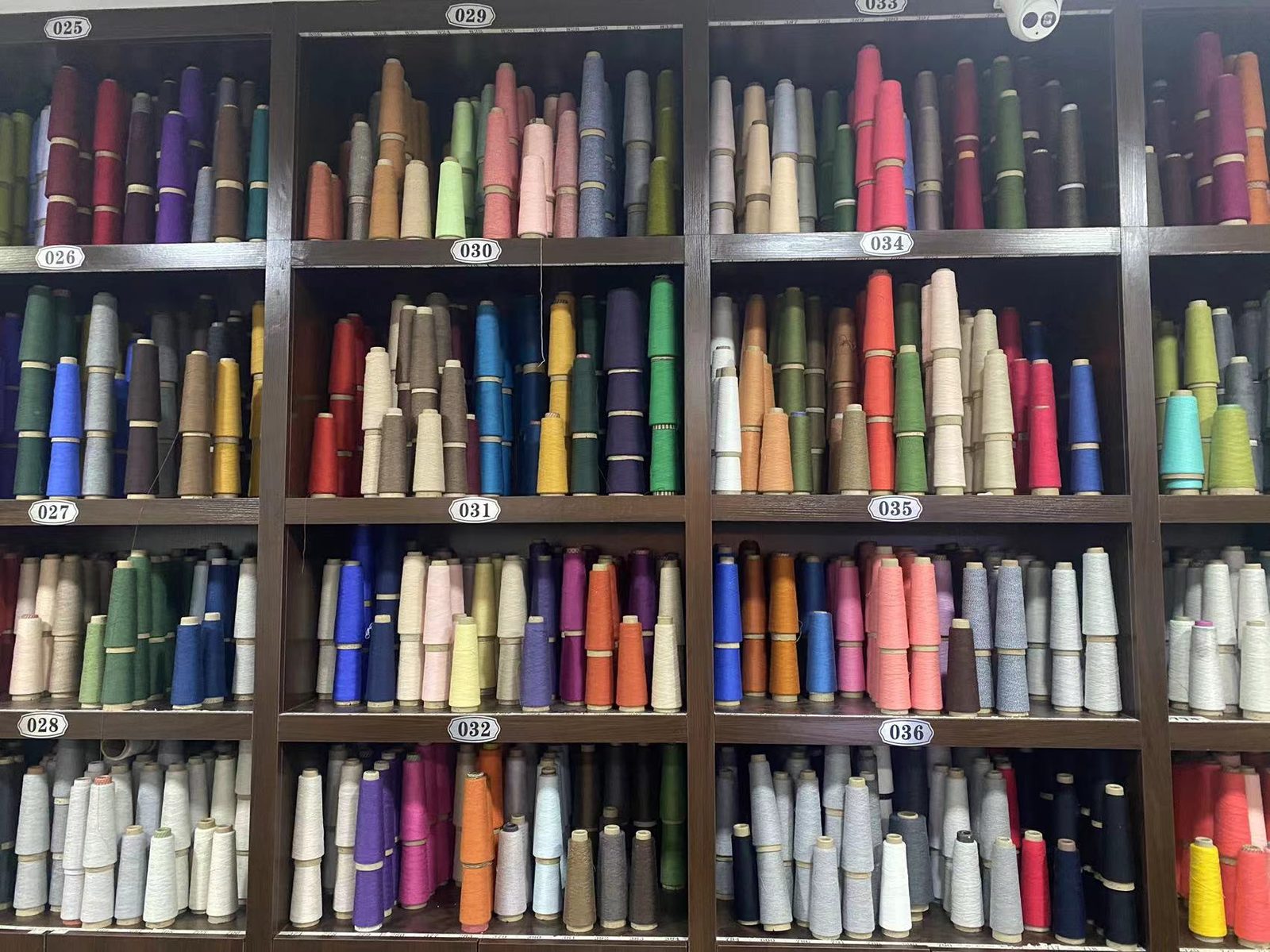TIANSHENG TEXTILE yarn color wall — 300+ in-stock colors